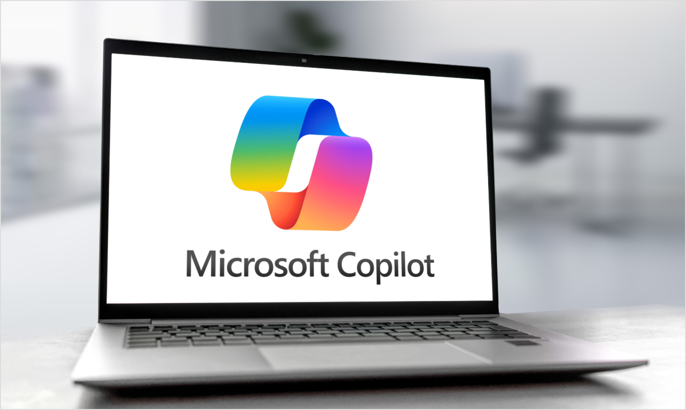 A laptop showing Microsoft Copilot logo