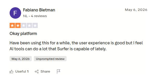 A user review on Trustpilot, discussing how Surfer SEO is an okay platform.